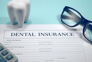 dental insurance claim form on desk