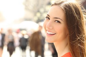 person with healthy glowing smile