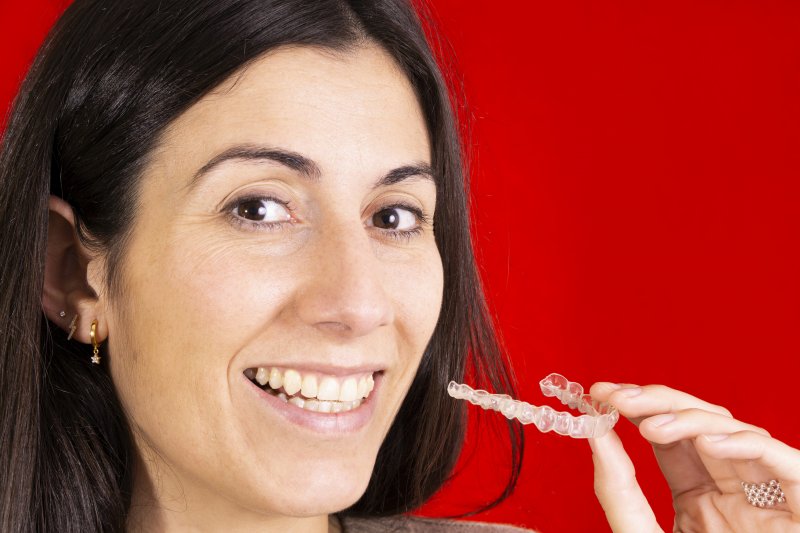 Woman with Invisalign in Virginia Beach