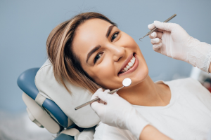 a patient visiting their dentist for an oral cancer screening